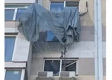 Парашютист приземлился на кондиционер на 13-м этаже, фото: хозяева квартиры удивили реакцией