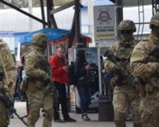 Остановка транспорта и проверка граждан: на улицах Киева люди с оружием, в СБУ сделали срочное заявление