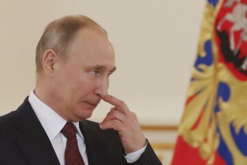 Путин