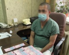 Хабар за відкриту труну: у Києві лікарі "наварилися" на родичах жінки, яку згубив ковід