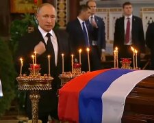 Путин на похоронах Лужкова