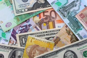 depositphotos_97414054-stock-photo-money-from-different-countries-dollars