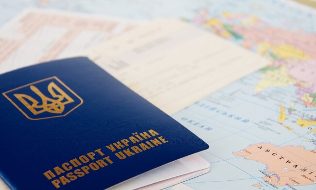 Passport and  Tickets on a World Map