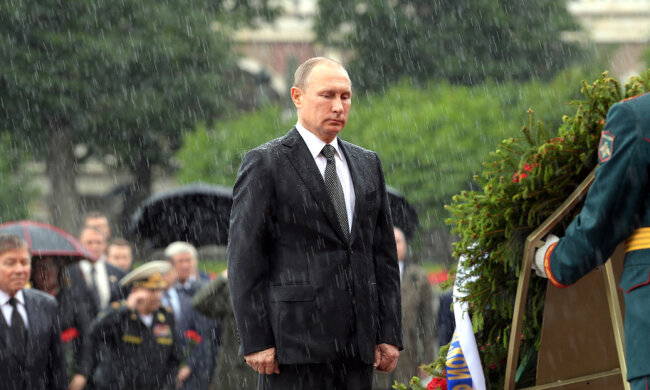 Путин