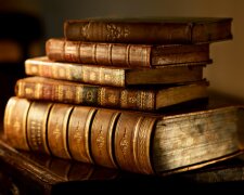 Old Covered Books on Table HD Wallpaper