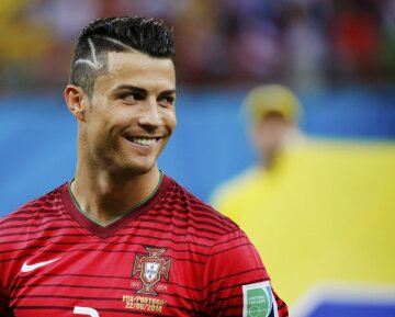Portugal’s Ronaldo smiles before their 2014 World Cup G soccer match against the U.S. at the A
