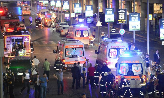 Paramedics help casualties outside Turkey’s largest airport, Istanbul Ataturk, Turkey, followi